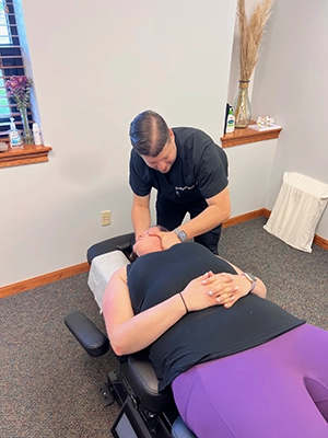 Chiropractor Schererville IN Miguel Esquinca Adjusting Patient